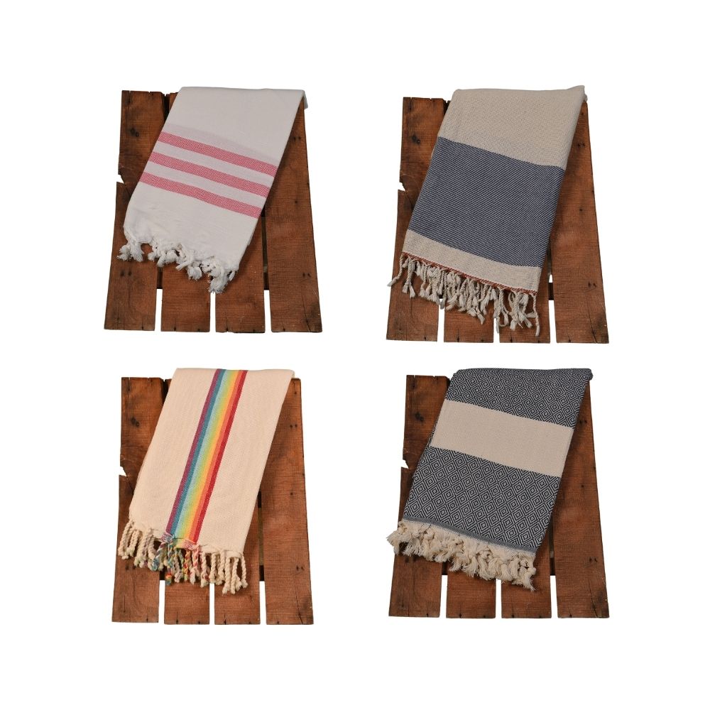 Enhance your beachwear collection with the luxury and quality of Wholesale Turkish Beach Towels from Cottonpolis. As a leading manufacturer in Denizli, Turkey, we offer an extensive collection of premium towels crafted from 100% Turkish cotton. Our beach towels are renowned for their softness, absorbency, quick-drying properties, and vibrant colors, making them the perfect choice for beachgoers and vacationers.  We offer a wide variety of styles, sizes, and patterns to elevate your customers' beach experien